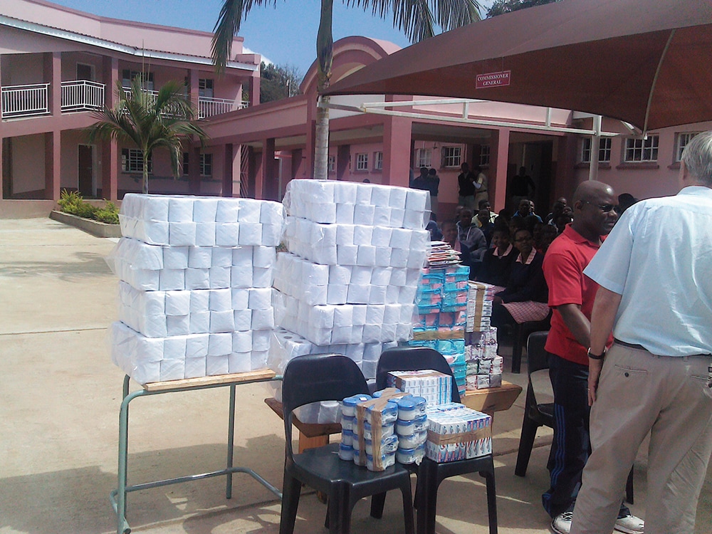 Toiletry donations including toilet rolls, toothpaste, cream and hand towels